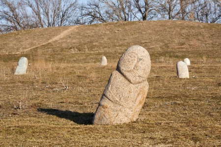 Kurgan stelae, Balbals historical stones on the territory of the specially protected archeology and architectural complex Burana Tower in Kyrgyzstan. public spaceの写真素材
