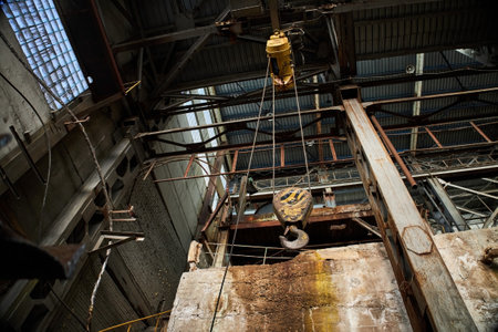dirty industrial crane hook, abandoned factoryの写真素材