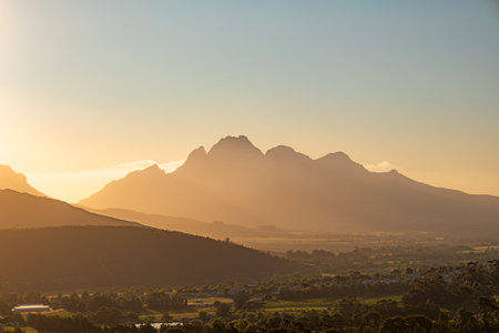 Mountains in golden hour sunset light. Simon's Mountain, Simonsberg, South Africa.の写真素材