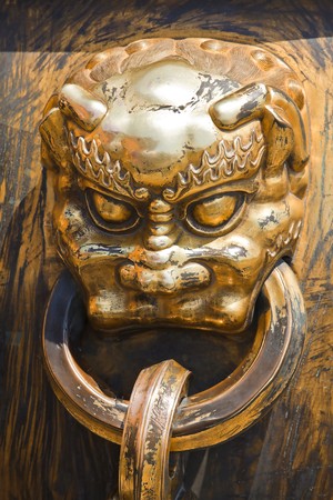 Ancient bronze lion as a handle in China Emperor Forbidden Cityの写真素材