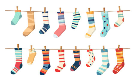 Socks on clothesline, cotton or wool socks hanging on rope with clothespins, cartoon vector. Socks laundry on line with pins, socks with color ornament pattern hanging on clothesline for kids designのイラスト素材