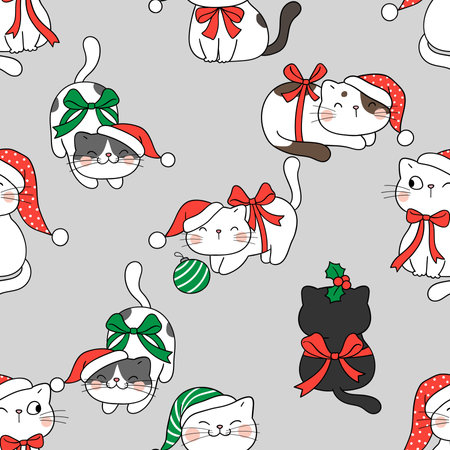 Seamless pattern with cute cartoon cats in Santa Claus hats.の写真素材