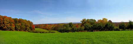 A beautiful panoramic shot of forest hills in the autumn. の写真素材