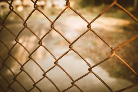 rusty chain link fenceの写真素材