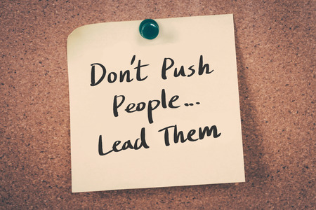 Don't push people...lead themの写真素材