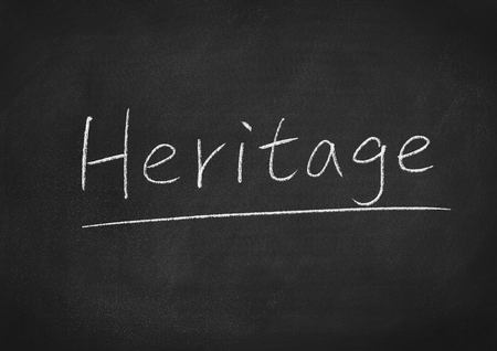 heritage concept word on a blackboard backgroundの写真素材