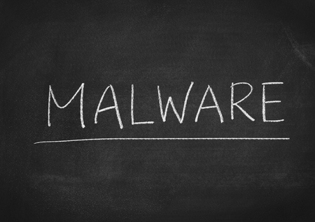 malware concept word on a blackboard backgroundの写真素材