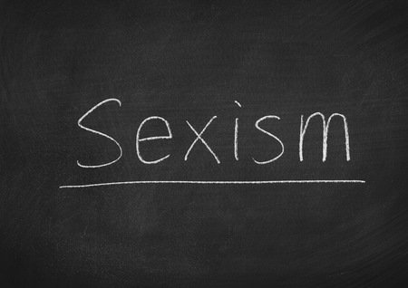 sexism concept word on a blackboard backgroundの写真素材