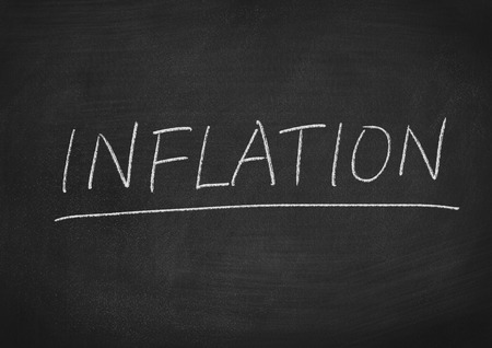 inflation concept word on a blackboard backgroundの写真素材