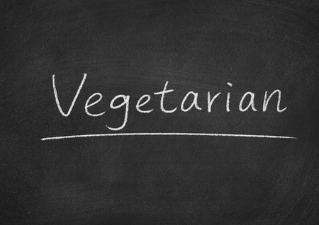 vegetarian concept word on a blackboard backgroundの写真素材