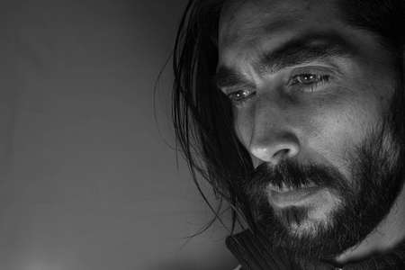 man thinking close-upの写真素材