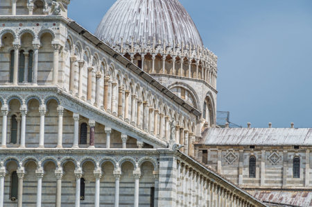 The church and buildings at the famous leaning tower of Pisaの写真素材