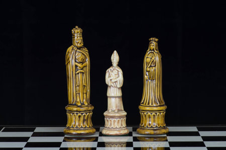 Chess pieces arranged with regard to clean background and blurの写真素材