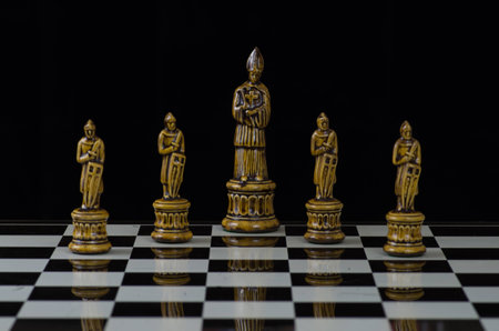 Chess pieces arranged with regard to clean background and blurの写真素材