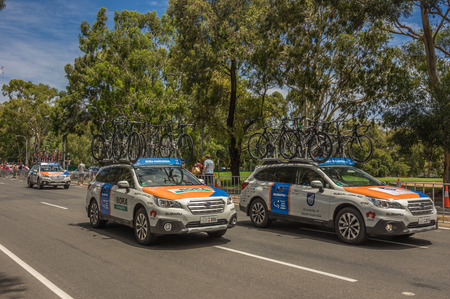 Adelaide South Australia 22 January 2017 The Tour Down Under races around the street circuit of central Adelaide and is serviced by the professional team cars following the racers closely behind.のeditorial素材
