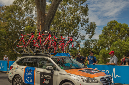 Adelaide South Australia 22 January 2017 The Tour Down Under races around the street circuit of central Adelaide and is serviced by the professional team cars following the racers closely behind.のeditorial素材