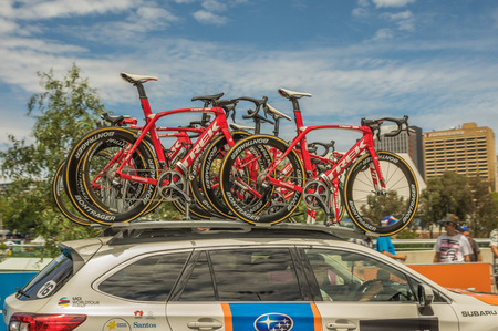 Adelaide South Australia 22 January 2017 The Tour Down Under races around the street circuit of central Adelaide and is serviced by the professional team cars following the racers closely behind.のeditorial素材
