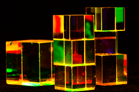 Abstract Cubes concept relecting bright prism colors in unique backgroundの写真素材