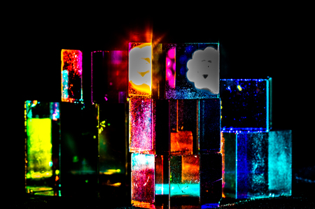 Abstract Cubes concept relecting bright prism colors in unique backgroundの写真素材
