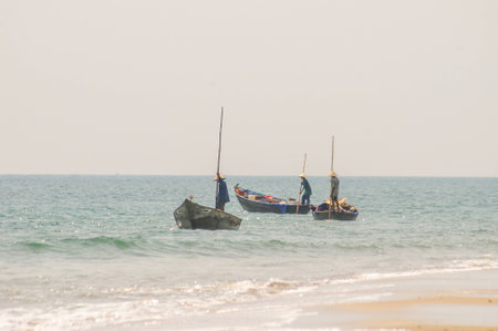 Traditional Vietnamese fishing along the beautiful coastline of Vietnamの写真素材