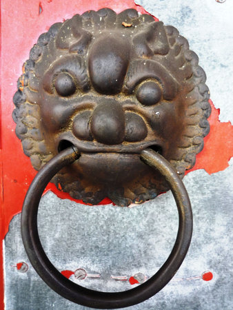 Detail shot of a door in a traditional chinese temple.