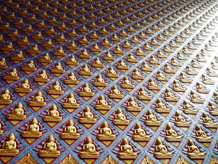 Wall of Buddha statues in Temple of Penang in Malaysiaの写真素材