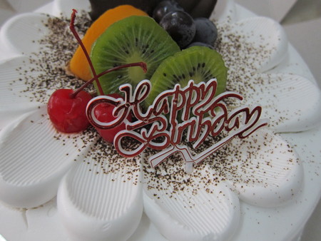 Delicious fruit sponge birthday cakeの写真素材