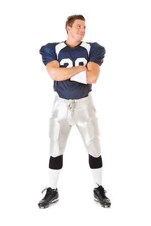 Caucasian American football player, in uniform, isolated on white, with various related props.の写真素材