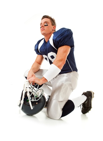 Caucasian American football player, in uniform, isolated on white, with various related props.の写真素材