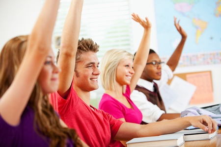 Extensive series of a multi-cultural group of students with a teacher, in a high school classroom setting.の写真素材