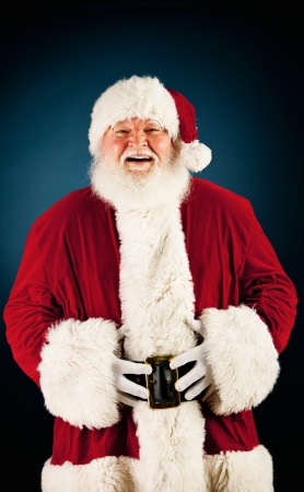 Extensive series of a Caucasian, Authentic Santa Claus Character on a blue background.の写真素材