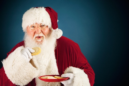 Extensive series of a Caucasian, Authentic Santa Claus Character on a blue background.の写真素材