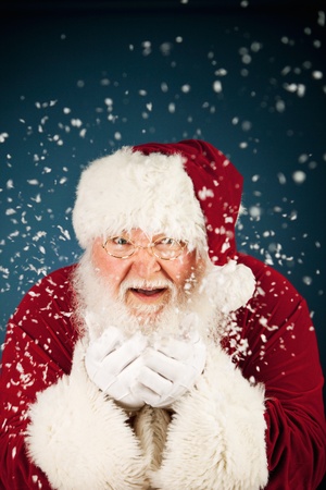 Extensive series of a Caucasian, Authentic Santa Claus Character on a blue background.の写真素材