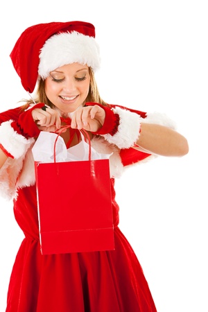 Caucasian female dressed in a cute Santa elf outfit.の写真素材