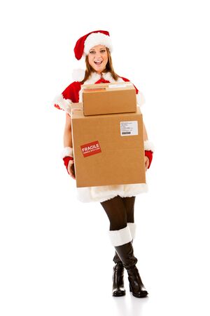 Caucasian female dressed in a cute Santa elf outfit.  Note, Fake address on box.の写真素材