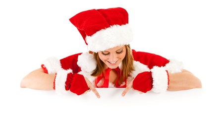 Caucasian female dressed in a cute Santa elf outfit.の写真素材