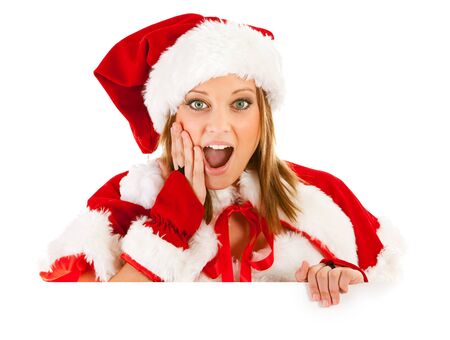 Caucasian female dressed in a cute Santa elf outfit.の写真素材