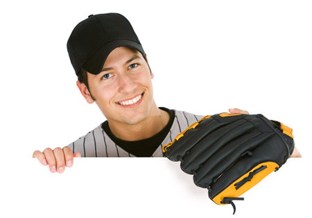 Baseball Player With Mitt Looks Over White Cardの写真素材