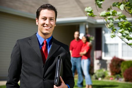 Home: Real Estate Agent Ready to Sell Homeの写真素材