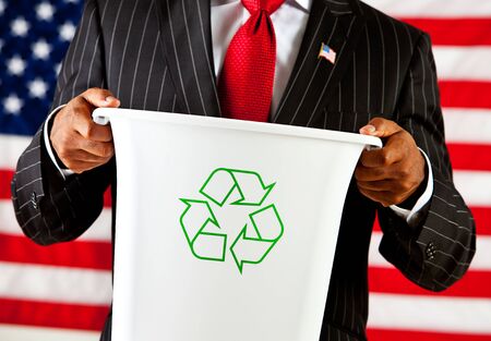 Politician: Holding Recycle Binの写真素材