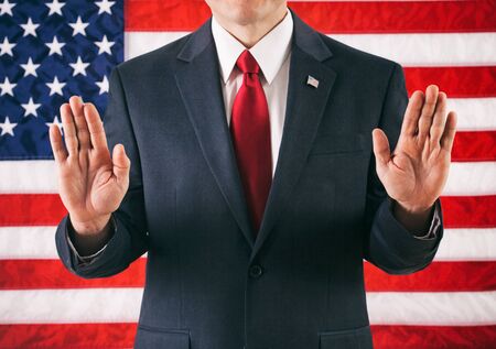 Politician: Man Standing With Hands In The Airの写真素材