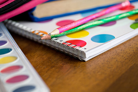 Education: Focus On Pencils On Top Of Notebook