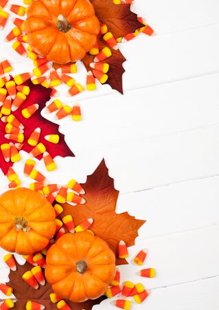 Autumn: Fun Halloween Holiday Candy And Pumpkin Backgroundの写真素材