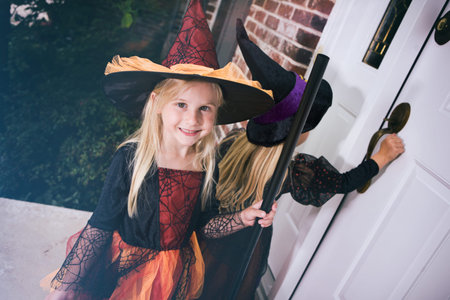 Halloween: Little Girl Waits For Door To Open On Front Porch