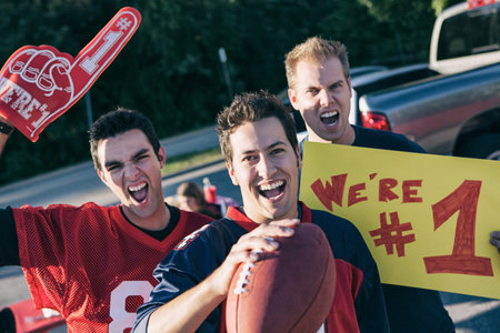 Tailgating: Male Football Fans Excited For Game