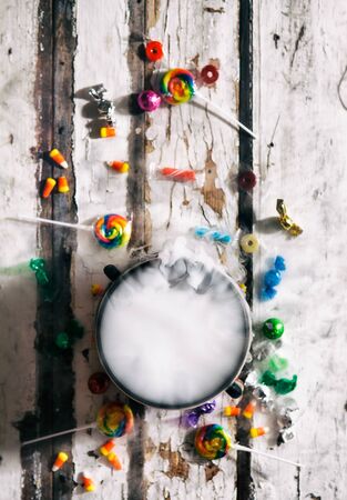 Halloween: Overhead View Of Potion Cauldron And Holiday Candyの写真素材