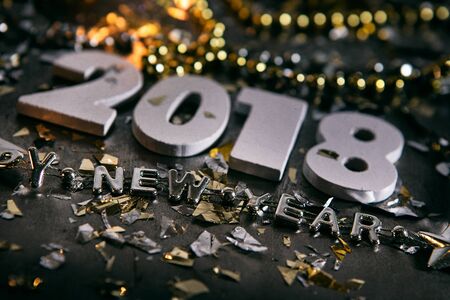 A series celebrating New Year's Eve, some with 2018 numerals.  Lots of confetti, champagne, etc. Good for backgrounds of ads.の写真素材