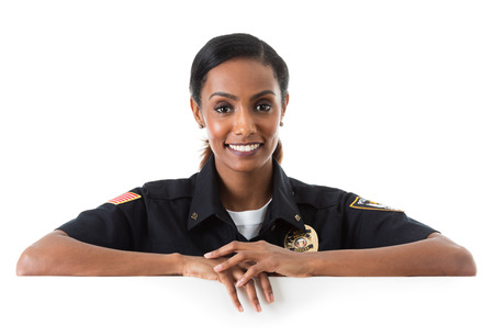 Extensive series of two police officers on white, with various props.  Also includes a child and a burglar.の写真素材