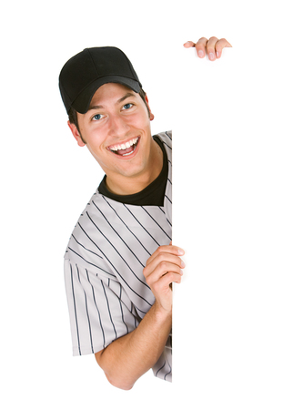 Isolated on white series of two men in baseball uniforms, in various poses with props.の写真素材