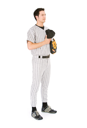 Isolated on white series of two men in baseball uniforms, in various poses with props.の写真素材
